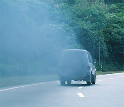 picture of car belching exhaust fumes