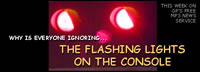 image of glowing red light; feature story is FLASHING LIGHTS ON THE CONSOLE
