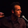 photo of Rob Newman doing standup