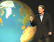al gore next to huge photo of earth; link for funny animation/video; opens in new window