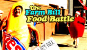 a man in an apple suit chasing a man in a Twinkie suit; click to go to video page; opens in new window