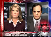 mock image of cable-news program interview, shows two people on screen with glitzy background; link for funny animation/video; opens in new window