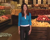 female show host in vegetable aisle