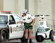 funny environmental ads link; thumb of green cop pulling over a regular cop