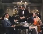 waiter and two diners; click to go to video page